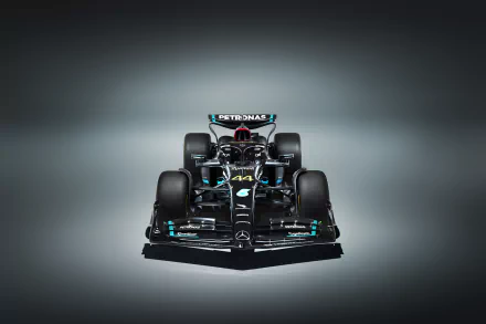 HD desktop wallpaper showing the front view of a Mercedes W14 Formula 1 car, set against a muted gray background.