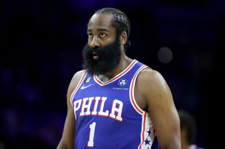 HD desktop wallpaper of James Harden in a Philadelphia 76ers NBA uniform, focused during a game.