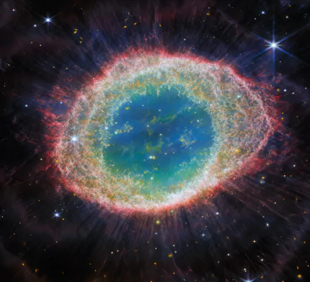 4K Ultra HD wallpaper featuring a vibrant nebula captured by the James Webb Space Telescope, blending sci-fi elements with cosmic beauty.
