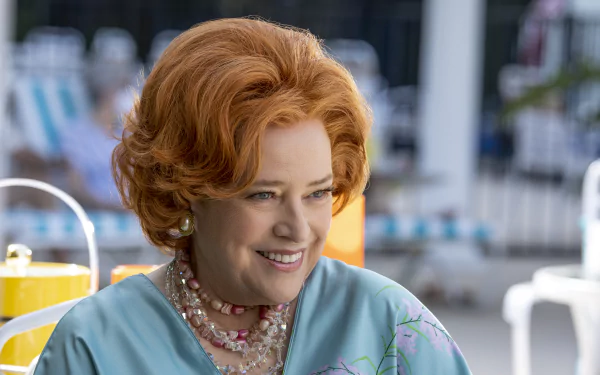 A smiling red-haired woman from Are You There God? It's Me, Margaret. movie, captured in HD for a desktop wallpaper.