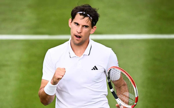 Dominic Thiem celebrates a point during Wimbledon 2023, showcasing his passion for tennis. This HD desktop wallpaper captures the spirit of competitive sports.