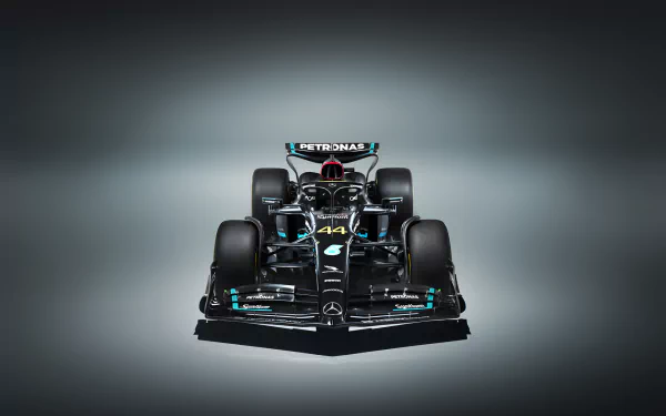 HD desktop wallpaper showing the front view of a Mercedes W14 Formula 1 car, set against a muted gray background.