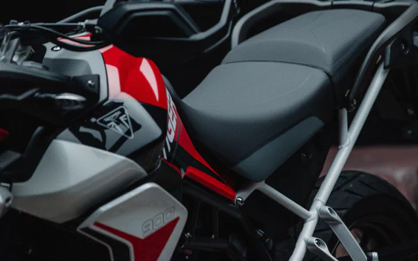 Close-up of the Triumph Tiger 900 GT Aragón motorcycle, showcasing its sleek design and modern features. An HD desktop wallpaper highlighting the vehicle's striking details.