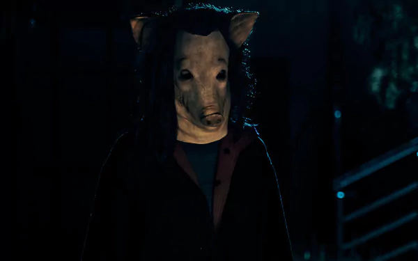 HD desktop wallpaper featuring a mysterious character with a horse mask, related to Saw X, set in a dimly lit, moody atmosphere.