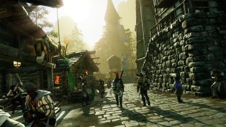 A bustling scene from the video game New World, featuring characters in medieval attire walking through a vibrant stone village with trees and distant towers in the background.