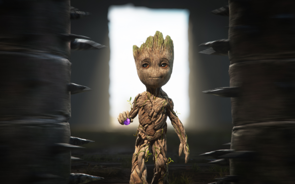 HD Desktop wallpaper featuring the character Baby Groot with a whimsical expression standing between tree trunks, perfect for 'I Am Groot' themed backgrounds.
