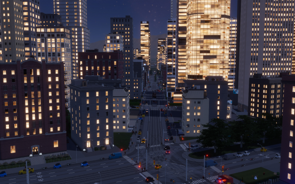 HD wallpaper of Cities: Skylines II showcasing a vibrant virtual cityscape with illuminated skyscrapers at night.
