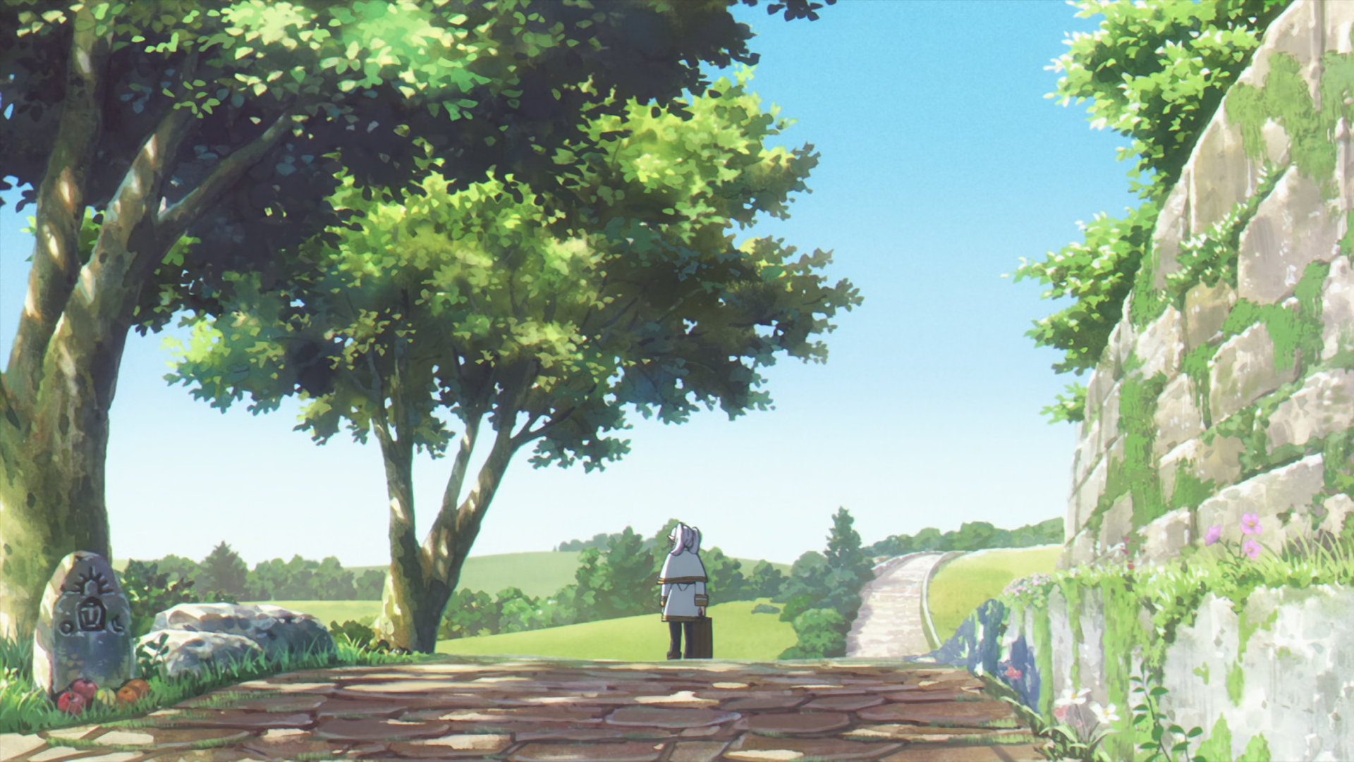 HD PC desktop wallpaper from the anime Frieren: Beyond Journey's End, featuring a serene outdoor scene with a character walking along a sunlit path under green trees.