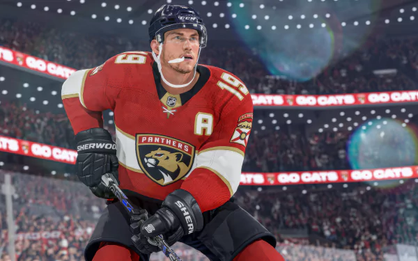 HD desktop wallpaper featuring a focused ice hockey player from NHL 24 video game with a vibrant stadium background.