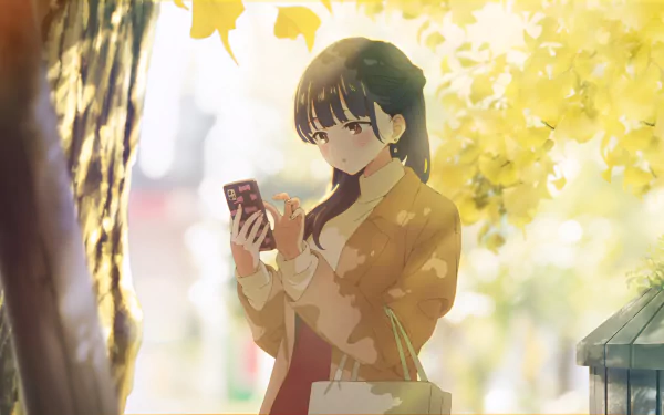 Anime-style 8K Ultra HD desktop wallpaper of Anna Yamada from The Dangers in My Heart, standing under golden autumn leaves while looking at her phone.