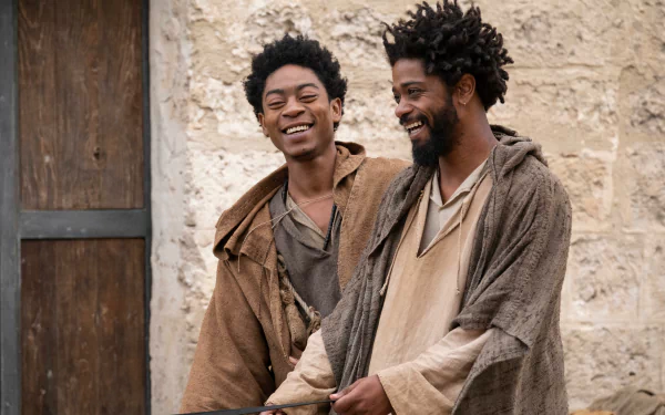 HD wallpaper of two characters smiling from the movie The Book of Clarence.