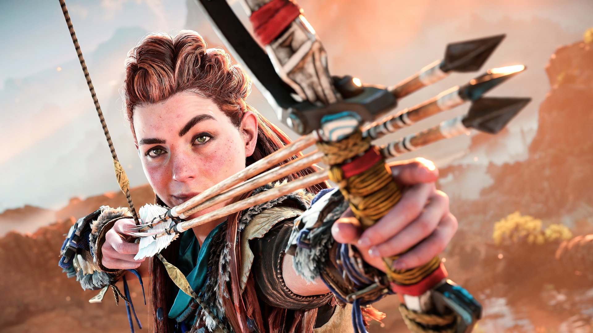 Aloy from Horizon Forbidden West aiming her bow, in a high-definition desktop wallpaper featuring the vibrant, post-apocalyptic game world.