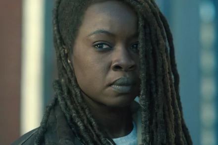 HD wallpaper featuring a serious-looking character from The Walking Dead: The Ones Who Live, suitable as a desktop background.