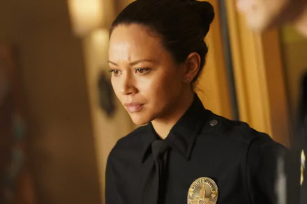 HD wallpaper featuring a serious-looking police officer from the TV show The Rookie.