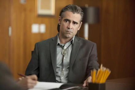HD wallpaper of a True Detective TV show character sitting thoughtfully at a desk with a badge, evoking the intense atmosphere of the series.