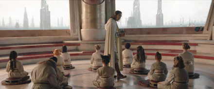 HD desktop wallpaper featuring a scene from The Acolyte TV show (2024) with a character teaching a group of young apprentices in a well-lit, architecturally elegant room.