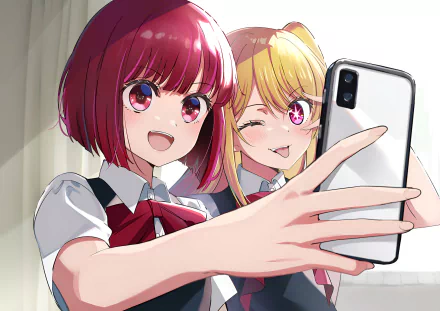 Anime HD wallpaper featuring Kana Arima and Ruby Hoshino from Oshi no Ko taking a selfie together with bright expressions and vivid colors.