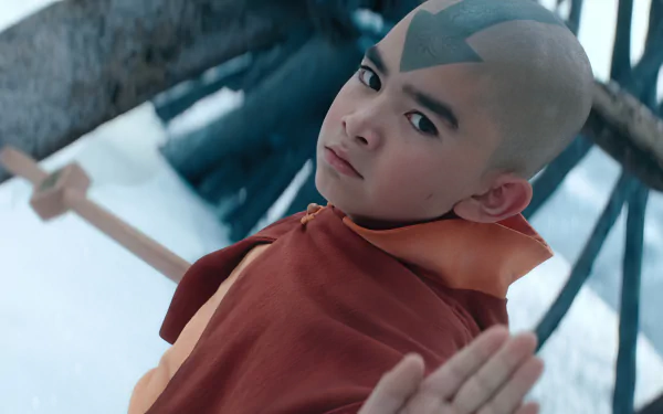 HD desktop wallpaper featuring Aang from Avatar: The Last Airbender TV show in a contemplative pose with a blurred background.