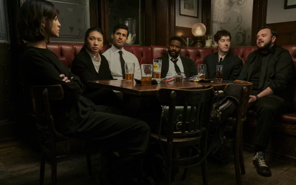 Cast members from the TV Show 3-Body Problem gathered in a dimly lit pub, featured in an HD desktop wallpaper.