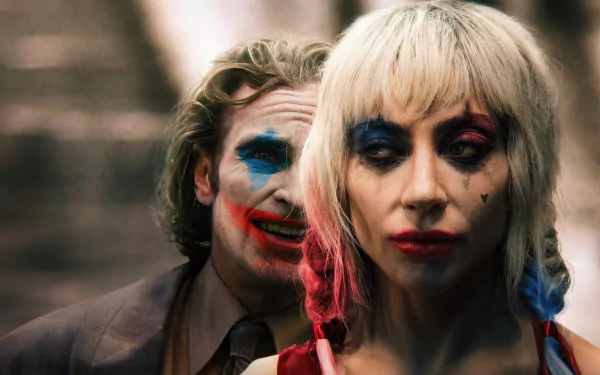 HD wallpaper featuring two characters with clown makeup, reminiscent of the Joker style, standing close to each other with intense expressions.
