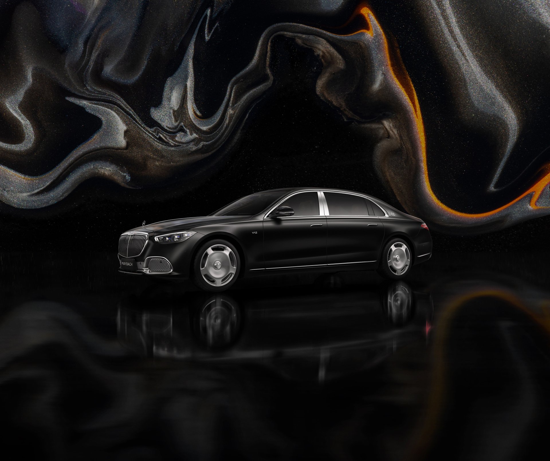 A high-definition desktop wallpaper featuring a sleek, black Mercedes-Maybach S 680 against an artistic, swirling dark background.
