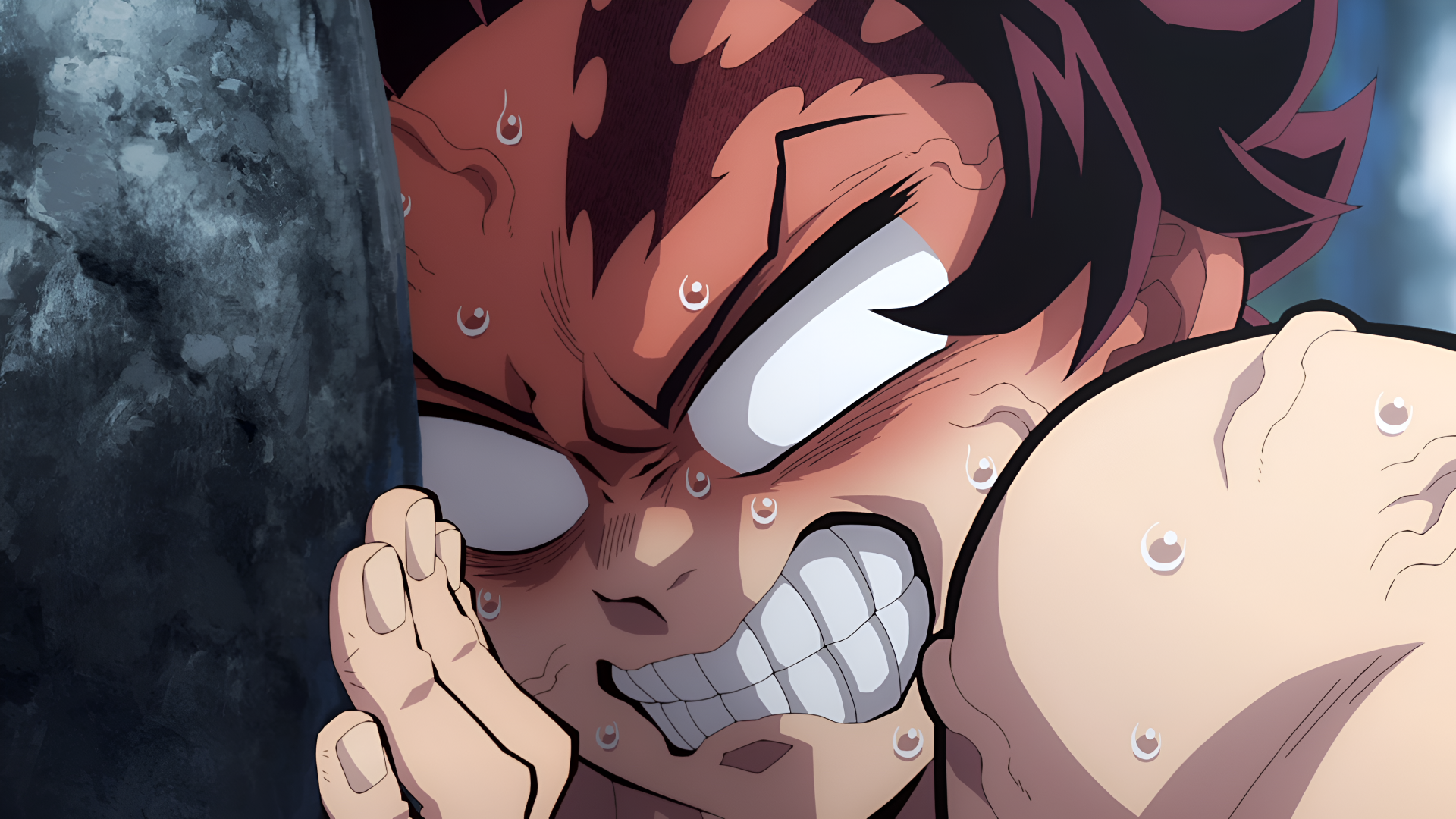 Anime 4K Ultra HD PC desktop wallpaper: Tanjiro Kamado from Demon Slayer: Kimetsu no Yaiba, sweating and gritting his teeth while pressing his hand against a stone.