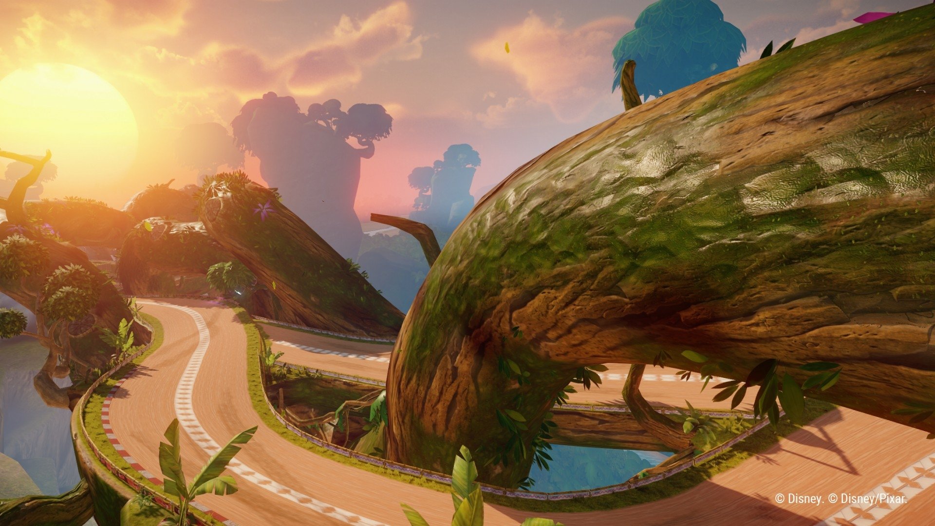 HD desktop wallpaper and background featuring a vibrant sunset scene from the video game Disney Speedstorm, showcasing a winding race track with lush greenery and towering, curved trees.