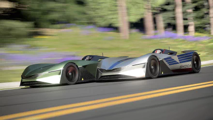 HD desktop wallpaper featuring the Skoda Vision GT, a futuristic sports car, speeding on a sunlit road.
