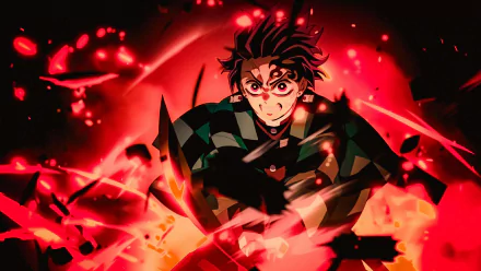 Anime-style 4K Ultra HD wallpaper featuring Tanjiro Kamado from Demon Slayer: Kimetsu no Yaiba amidst fiery red and black flames.