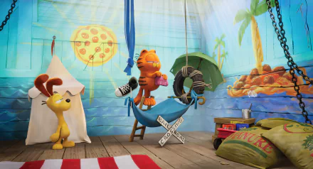 HD desktop wallpaper featuring Garfield and Odie from The Garfield Movie. Garfield is lounging in a hammock with various objects, while Odie stands nearby next to a tent, beach-themed background.