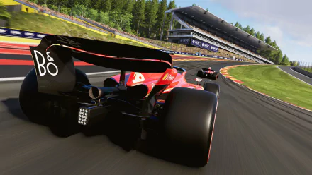 HD wallpaper of the video game F1 24, featuring a close-up of a racing car speeding on a track with a grandstand and trees in the background.