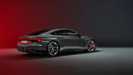 HD desktop wallpaper featuring the sleek and stylish Audi RS e-Tron GT in a sophisticated setting, showcasing its dynamic design and luxurious appeal.