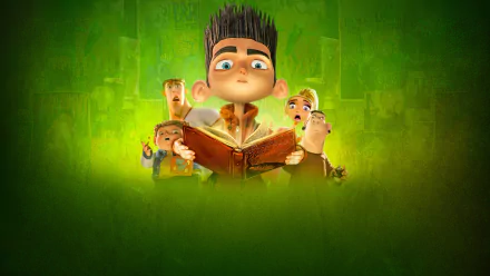 Paranorman 2K Quad HD PC desktop wallpaper and background: Norman holds a glowing book with wide-eyed kids and a dog behind him against an eerie green backdrop.