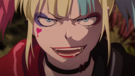 A vivid HD desktop wallpaper featuring an intense close-up of Harley Quinn from the anime series Suicide Squad Isekai, showcasing her bold makeup and mischievous expression.