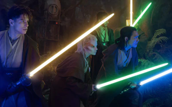 HD desktop wallpaper from the TV show The Acolyte (2024), featuring Jedi wielding colorful lightsabers in a forest setting.