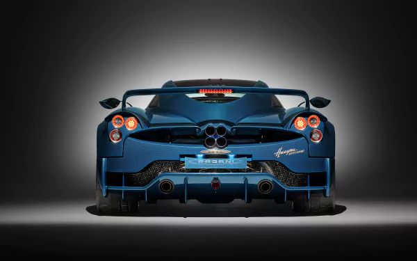 HD desktop wallpaper showcasing the rear view of a Pagani Huayra Epitome, highlighting its sleek design and elegant blue color.