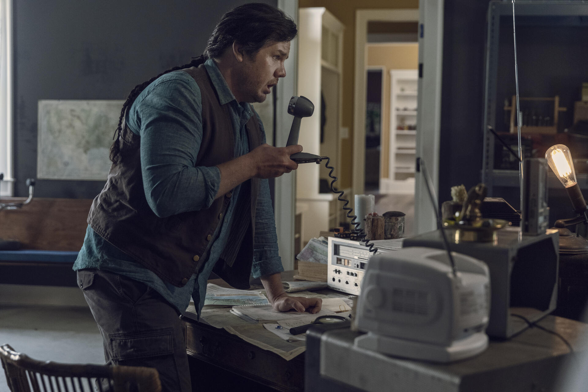 HD wallpaper of Josh McDermitt from the TV show The Walking Dead, depicting a dramatic scene that captures the show's intense atmosphere.