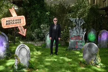 An 8K Ultra HD desktop wallpaper inspired by Tim Burton's Beetlejuice, capturing the movie's unique style and vivid imagery for fans and enthusiasts.