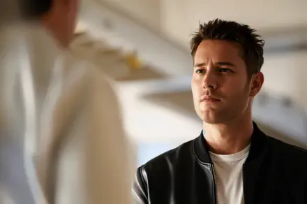 Justin Hartley appears in a scene from the TV show Tracker (2024), featuring a contemplative expression in a stylish HD wallpaper setting.