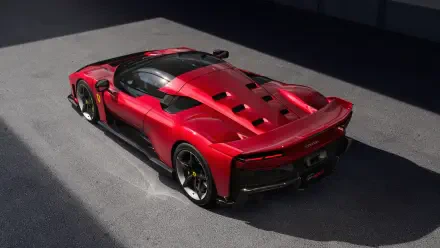 A stunning red Ferrari F80 showcases its sleek design, featuring aerodynamic lines and distinctive detailing, captured in high-resolution 8K Ultra HD.