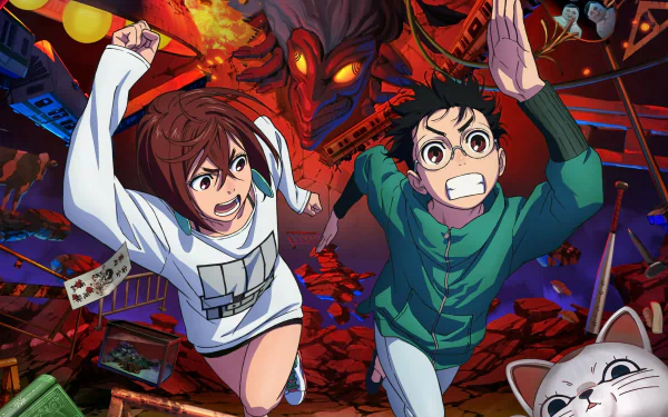HD desktop wallpaper featuring anime characters Momo Ayase and Ken Takakura from Dandadan, with dynamic action poses and a fiery, intense background.