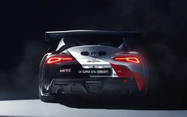 A sleek Toyota Supra GTS Concept in a dramatic backdrop, showcasing its distinctive rear design and bold features. This 4K Ultra HD image serves as a striking PC desktop wallpaper.
