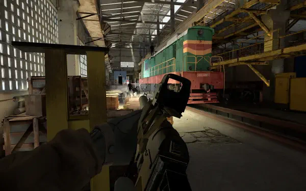 A dramatic HD wallpaper from Into the Radius VR, featuring a player's viewpoint with a weapon in hand, set against an industrial backdrop with a colorful train.