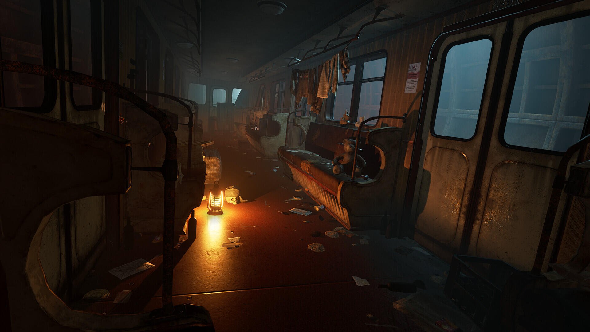 A haunting scene from the video game Metro Awakening, featuring a dimly lit, abandoned subway car with scattered debris and a flickering candle casting eerie shadows.