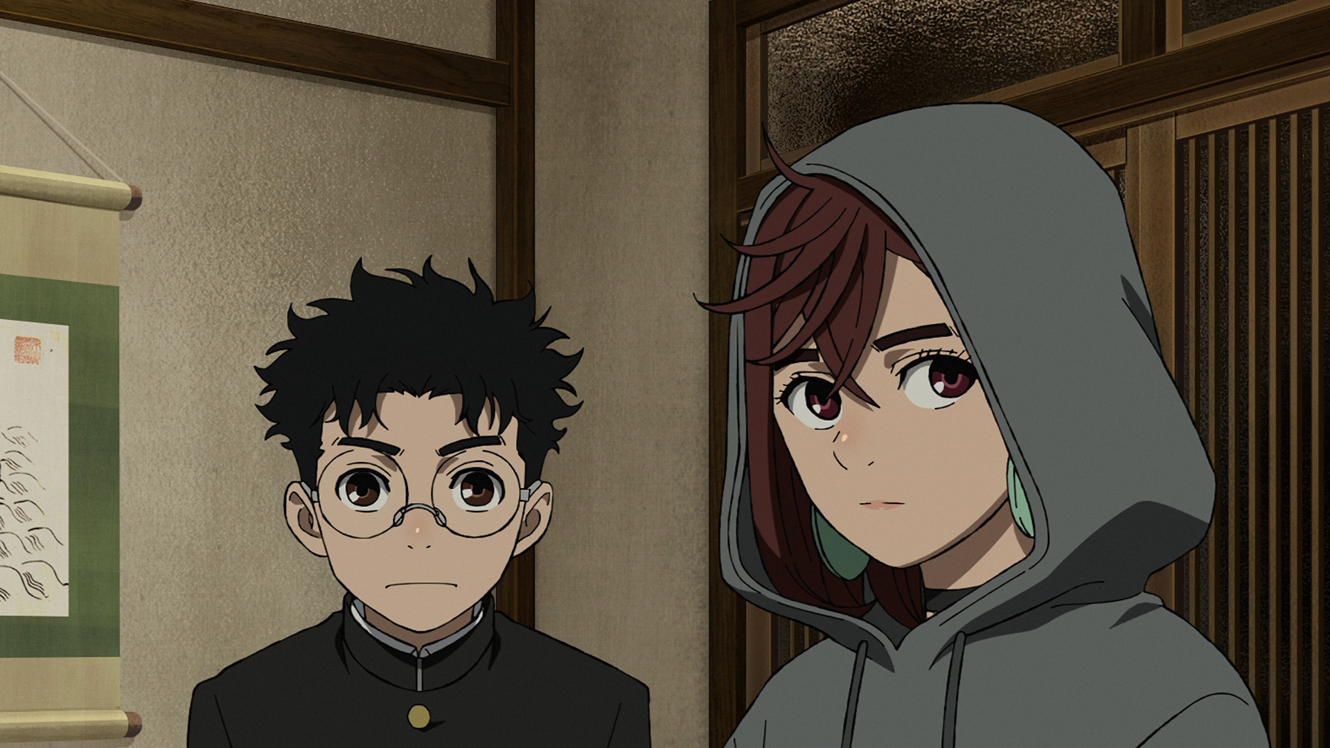 HD anime desktop wallpaper featuring Momo Ayase and Ken Takakura from Dandadan, showcasing vibrant character designs in a detailed indoor setting.