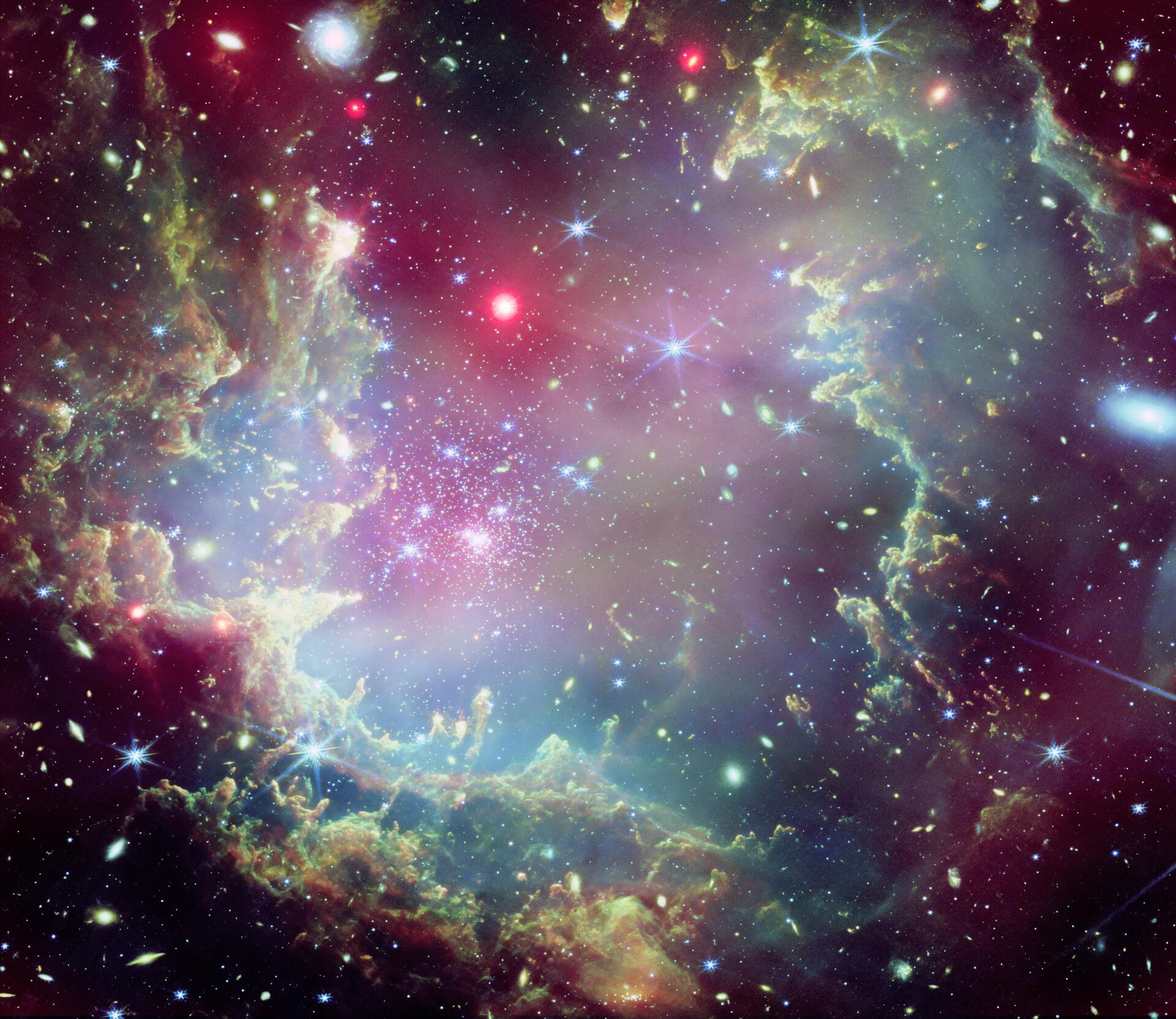 A vivid 4K Ultra HD image from the James Webb Space Telescope showcasing a stunning galaxy, filled with colorful cosmic elements and deep space beauty.