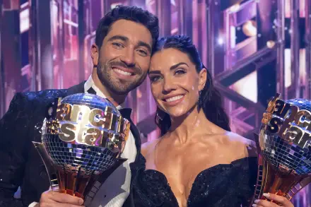 Joey Graziadei and his partner celebrate with their trophies on Dancing with the Stars, showcasing their success in an electrifying performance backdrop. HD wallpaper option available.