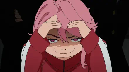 HD PC wallpaper of Aira Shiratori (Dandadan) — anime close-up with pink hair, sly grin, hands on her forehead against a dark background.