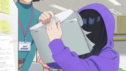 A vibrant anime scene featuring two characters in a workspace, one in a purple hoodie hiding behind a stack of papers, creating a dynamic and engaging background for HD PC desktops.