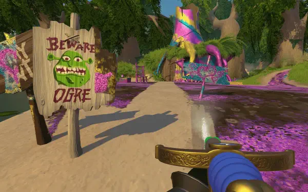 A vibrant HD wallpaper from PowerWash Simulator's Shrek Special Pack, featuring a Beware Ogre sign amidst a whimsical, colorful landscape.